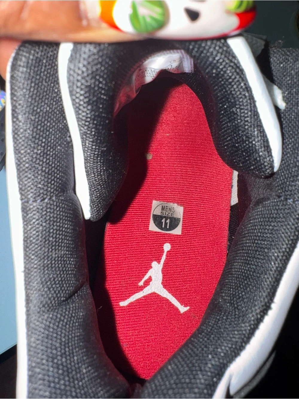 Jordan Black and White Woven Upper Sneakers